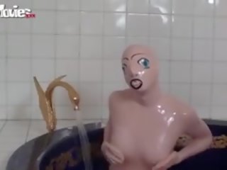 Tanja Takes A Bath In Her Latex porn Doll Costume